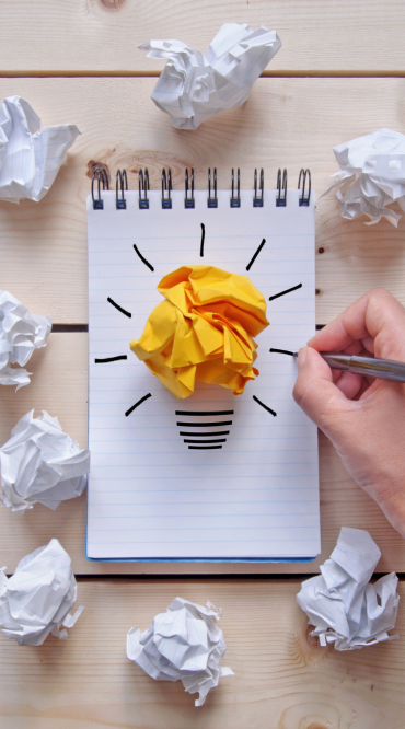 A man putting his ideas into paper